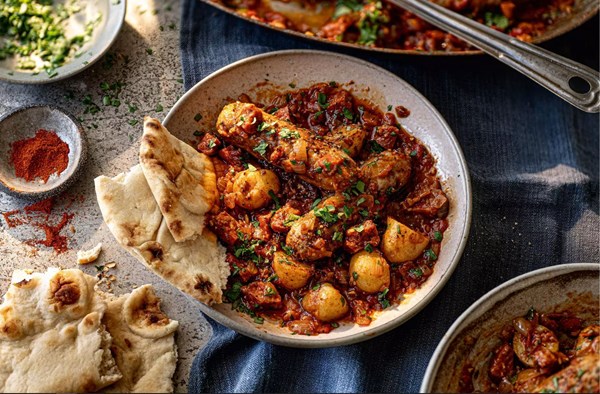 Goan-inspired chorizo, sausage & potato one pot