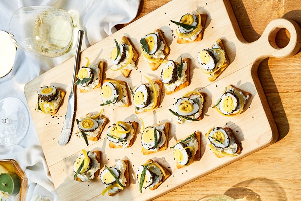 Goat cheese and quail egg canapés