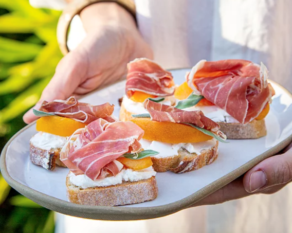 Goat cheese canapés with peach, sage & prosciutto