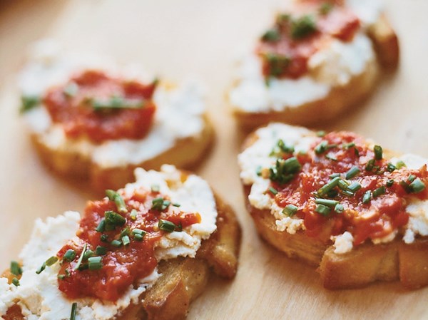 Goat cheese crostini with pickled peppers