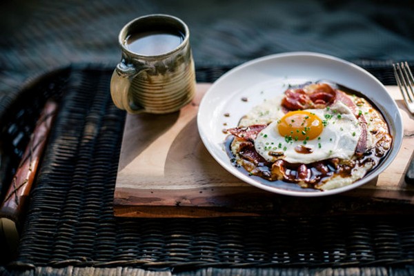 Goat cheese grits with red eye gravy, country ham, and a fried egg