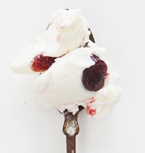 Goat cheese ice cream with roasted red cherries
