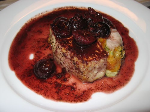 Goat cheese stuffed pork tenderloin with red wine balsamic cherry sauce