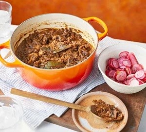 Goat mole chilli with pickled radishes 