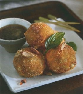 Goat's cheese fritters stuffed with Thai basil, with sherry vinegar, palm sugar and almonds