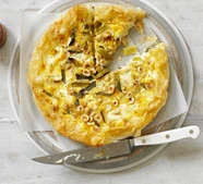 Goat's cheese, spring onion & hazelnut tart