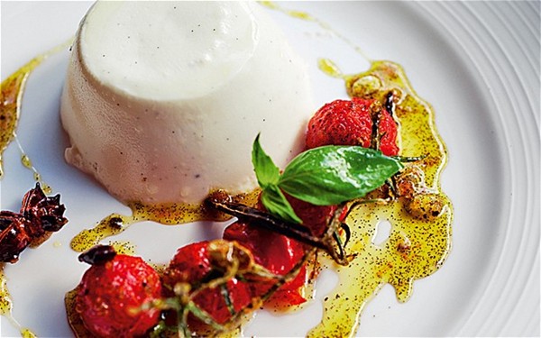 Goats' milk panna cotta, with candied tomatoes