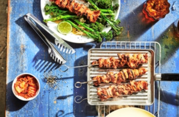Gochujang minute steak skewers with charred broccolini and lime