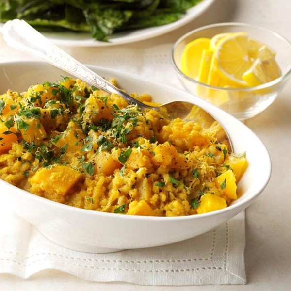 Golden beet curry risotto with crispy beet greens