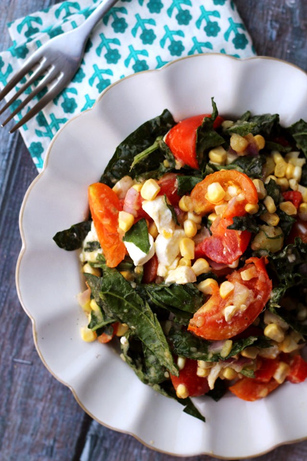 Golden corn salad with tomatoes, mozzarella, and fresh basil