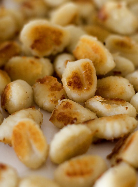 Golden, crispy gnocchi with summer shell beans
