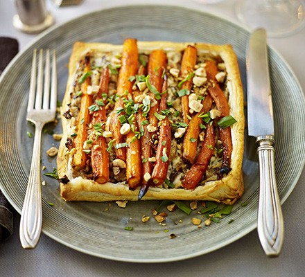 Golden-glazed carrot, mushroom & hazelnut tart