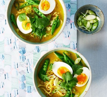 Golden noodle soup with soft boiled eggs