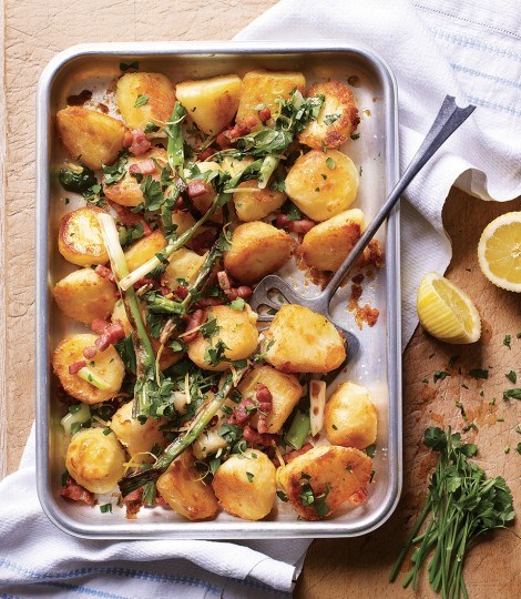 Golden roasties with bacon, spring onions, lemon and parsley