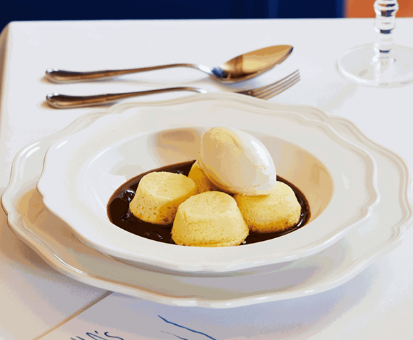 Golden syrup dumplings, rum, raisin and malt cream
