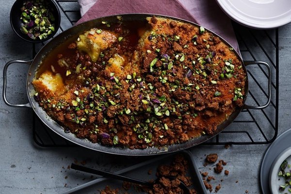 Golden syrup pudding with pistachio crumble