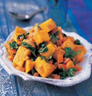 Golden yam cubes with spinach