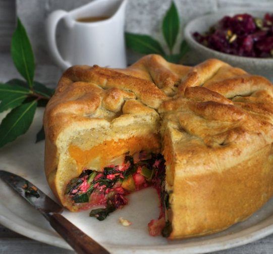 Goodwill pie and sticky cider gravy with warm red cabbage and golden raisins