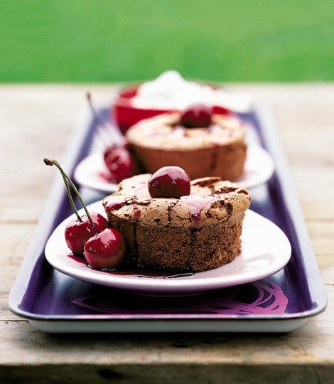 Gooey chocolate puds with whole cherry sauce