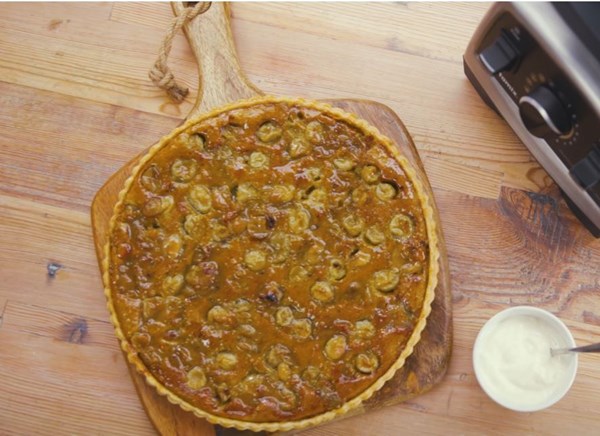 Gooseberry, turmeric & pistachio frangipane tart [Anna Hansen]