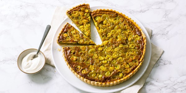 Gooseberry, turmeric and pistachio frangipane tart