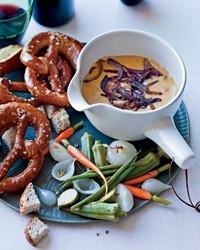 Gouda, pancetta and onion fondue with pretzels