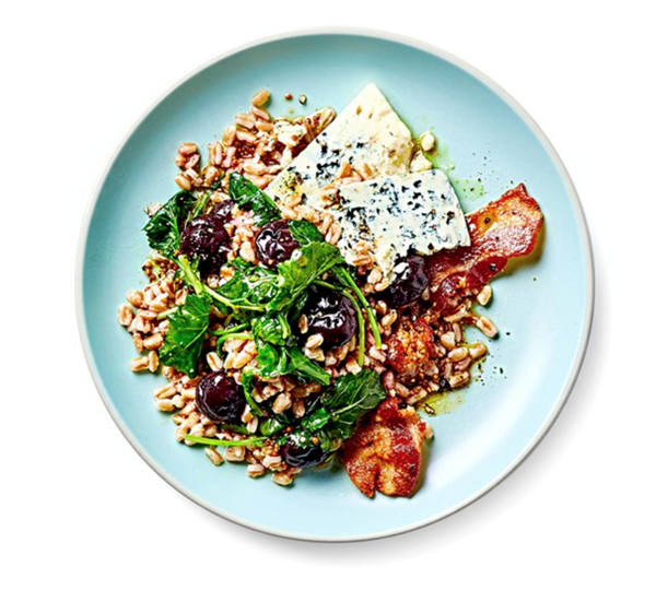 Grain salad with greens, cherries, and crispy bacon