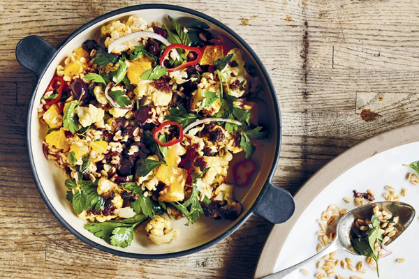 Grains with roasted cauliflower, black olives & oranges