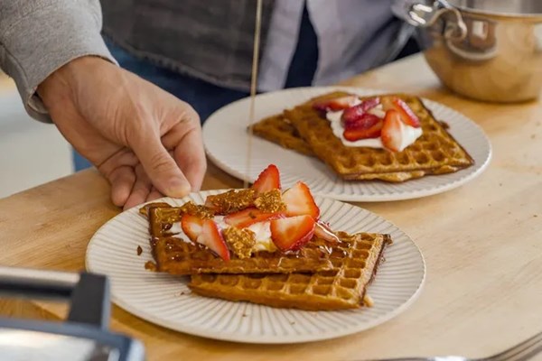 Granola waffles with maple-granola brittle & yogurt