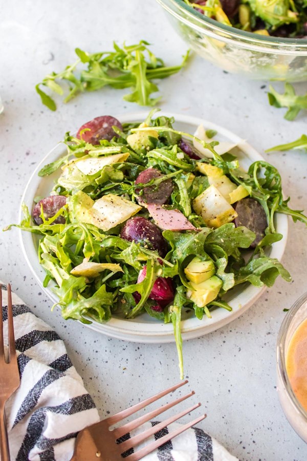 Grape, avocado and arugula salad