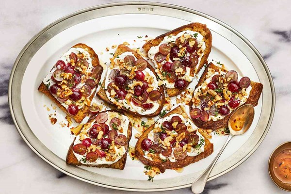 Grape, walnut, and labneh toasts with hot honey