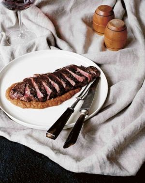 Grass-fed porterhouse with caramelised onion purée and pepper sauce