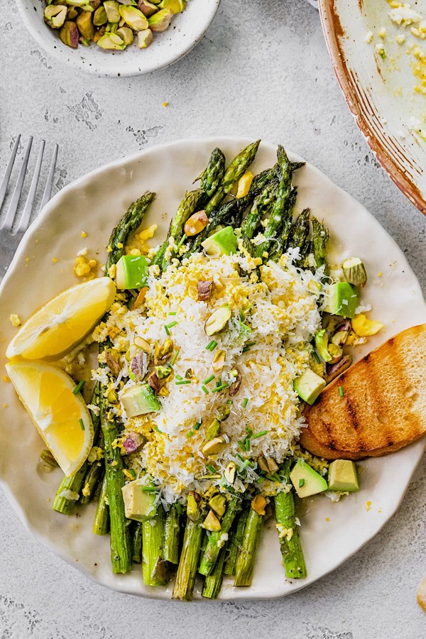 Grated egg avocado asparagus salad