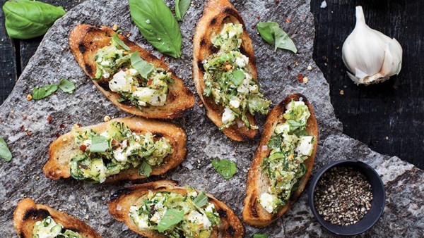 Grated zucchini and feta bruschetta