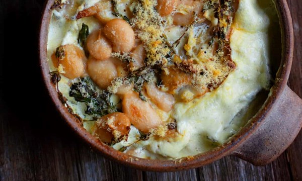 Gratin of smoked haddock, purple sprouting broccoli and beans