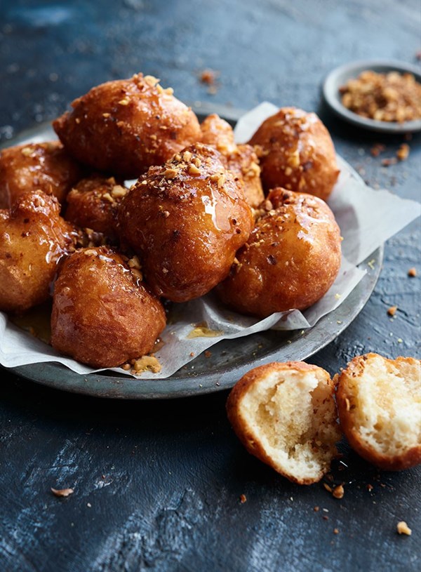 Greek doughnuts with honey syrup and walnuts (Loukoumades)