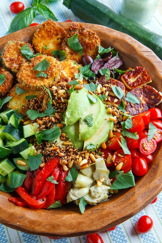 Greek goddess grain bowl with fried zucchini, halloumi and toasted seeds
