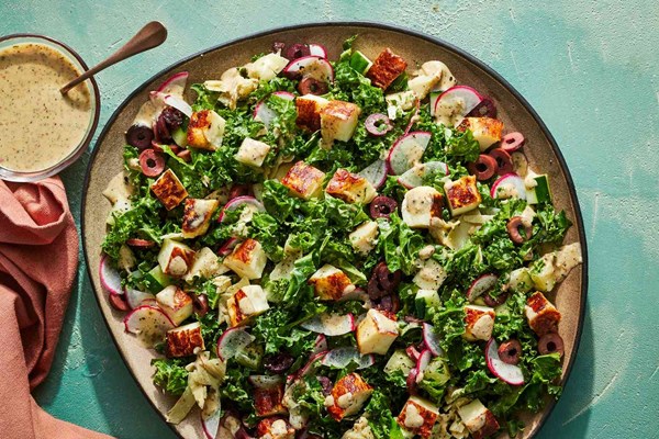 Greek kale salad with fried halloumi