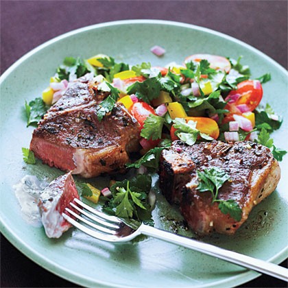 Greek lamb chops and mint yogurt sauce with tomato-parsley salad