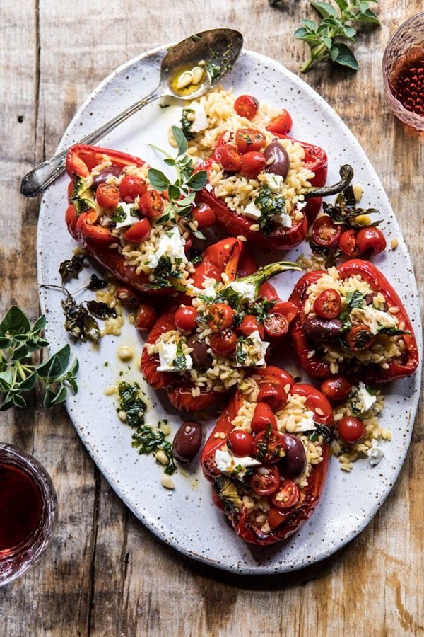 Greek orzo stuffed red peppers with lemony basil tomatoes
