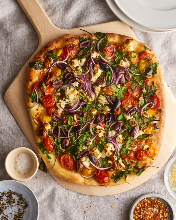 Greek pizza with spinach, feta, and olives