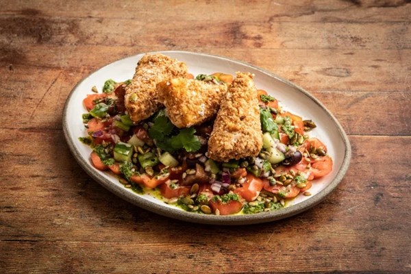 Greek salad with heirloom tomatoes, deep-fried feta, salsa verde and tahini