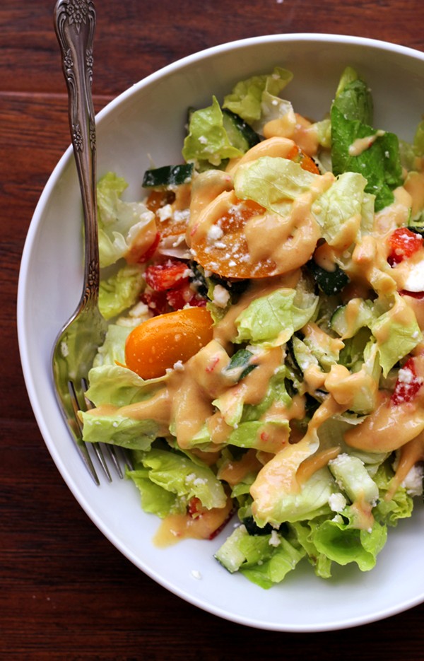 Greek salad with hummus dressing