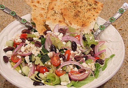 Greek salad with seasoned flatbread
