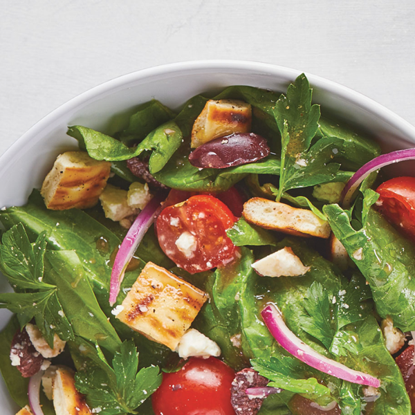 Greek spinach salad with pita croutons