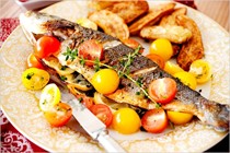Greek-style fish with marinated tomatoes