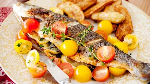 Greek-style fish with marinated tomatoes 