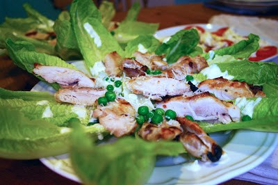 Greek yoghurt Caesar marinade dressing with grilled chicken and peas