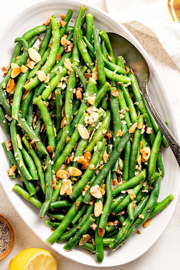 https://716f24d81edeb11608aa-99aa5ccfecf745e7cf976b37d172ce54.ssl.cf1.rackcdn.com/green-beans-almondine-3148918l1.jpg