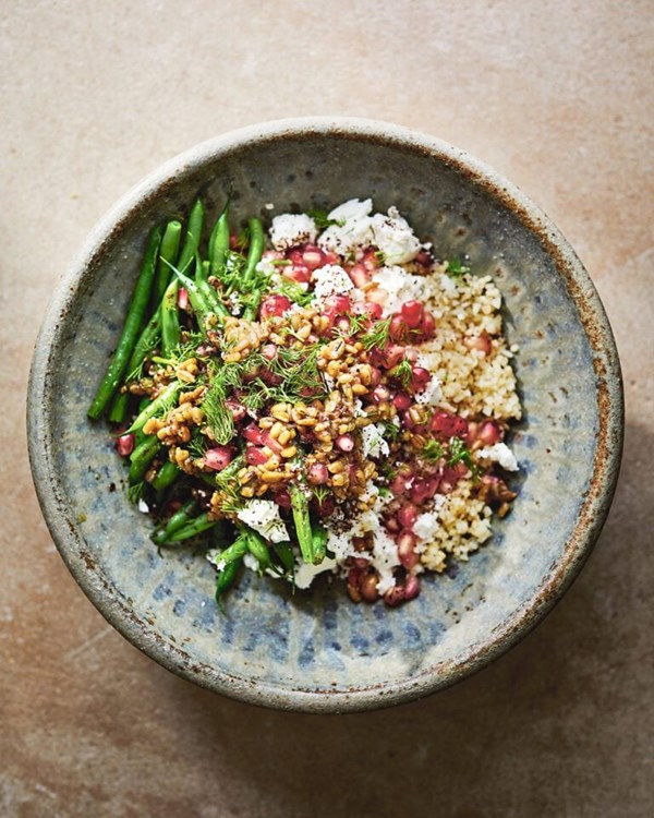 Green beans, bulgur, feta and pomegranate with sunflower seed dressing 